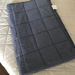 Weighted blanket for one person.